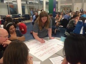 Parents discuss FCPS high school bell changes at Reston meeting.