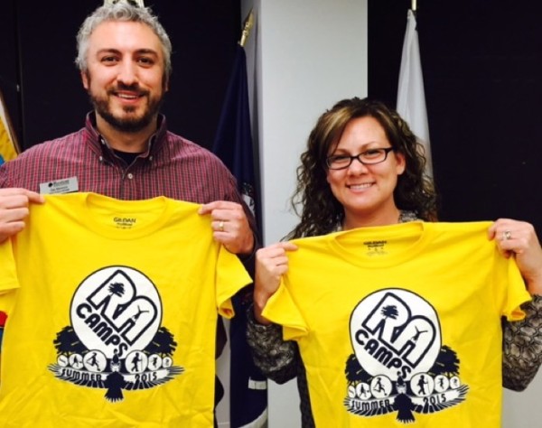 RA Camp Program Manager Dan Merenck (left) and Deputy Director for Recreation Laura Kowalski show off 2015 camp T-shirts