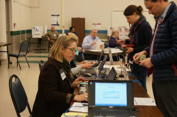 Super Tuesday voters check in at South Lakes HS polling place